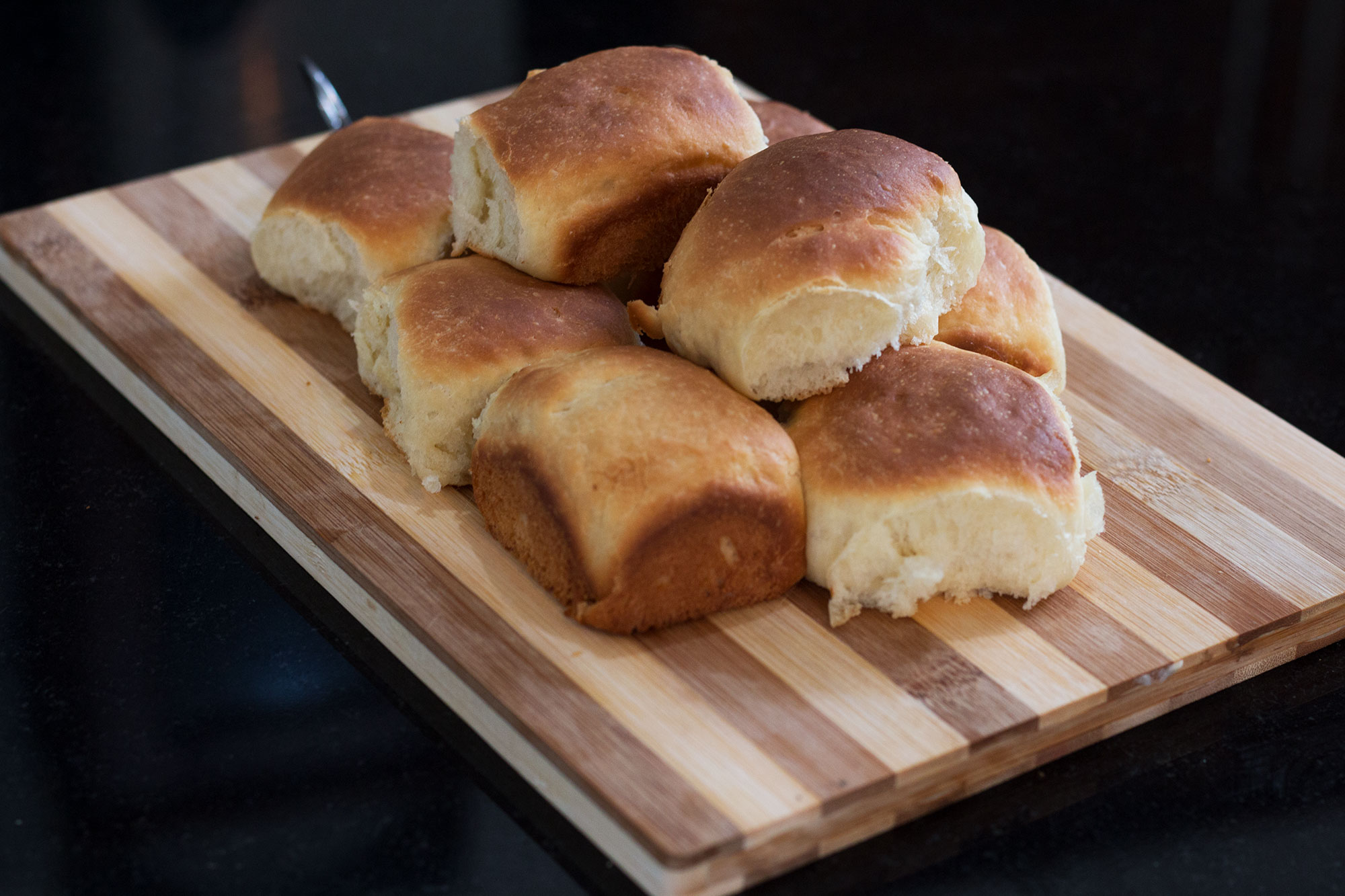 Dinner Rolls on a cutting board