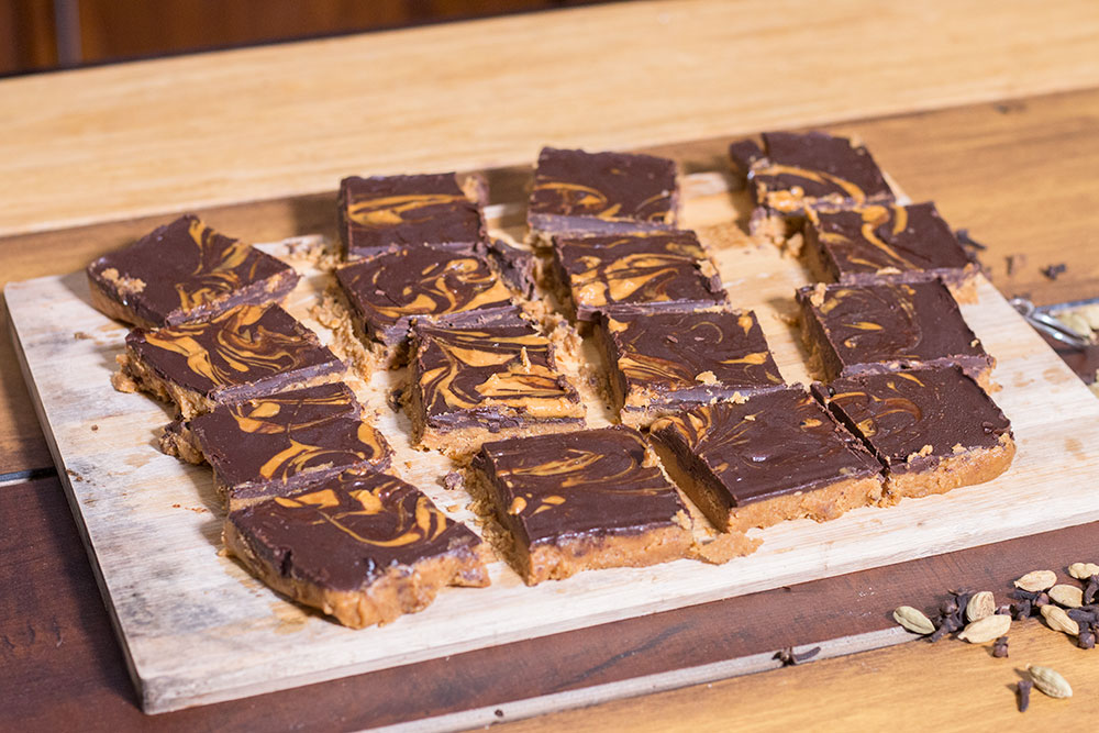 Chocolate Peanut Butter Bars on a cutting board