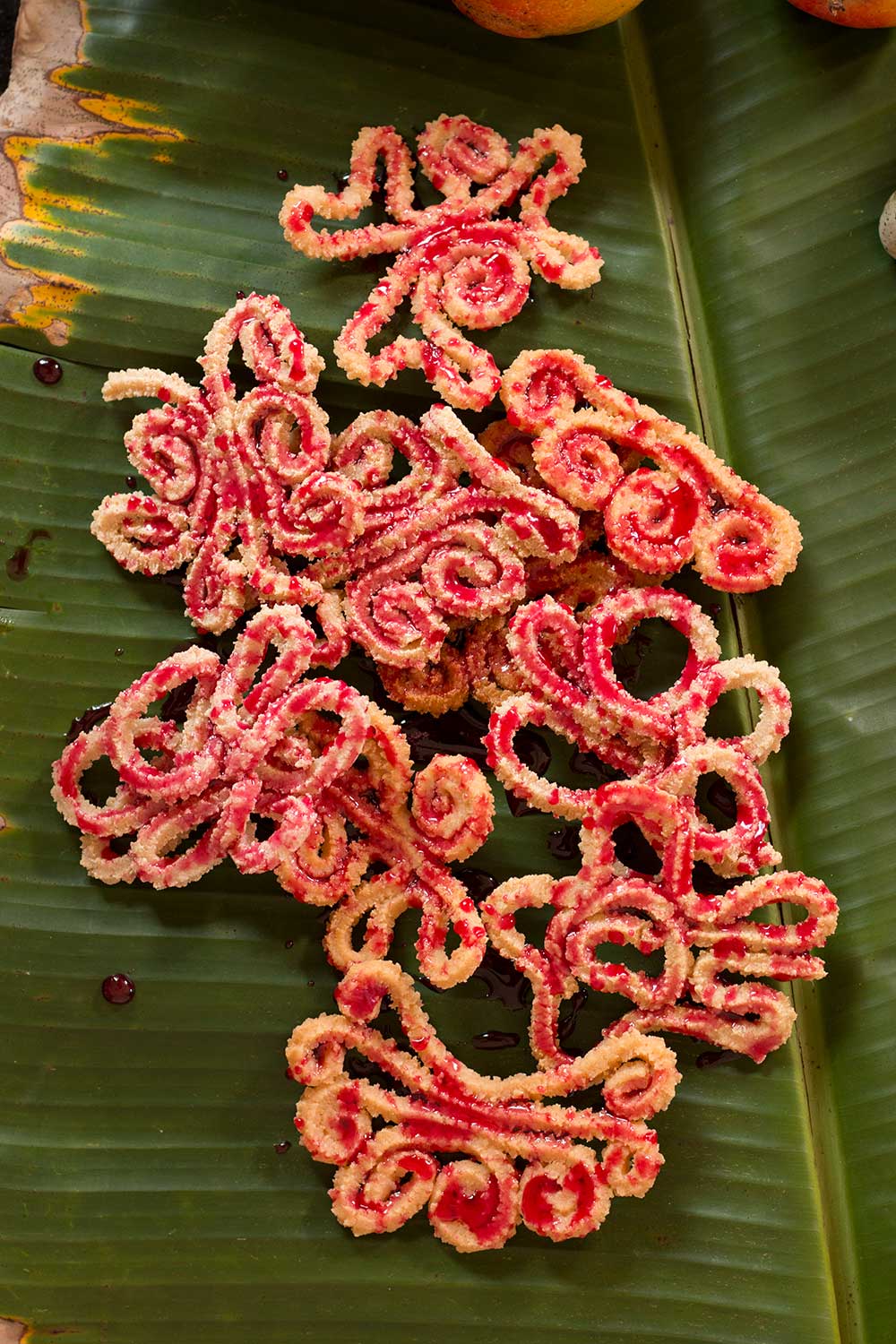 Prepared Vibara kept on a banana leaf with cashe fruits