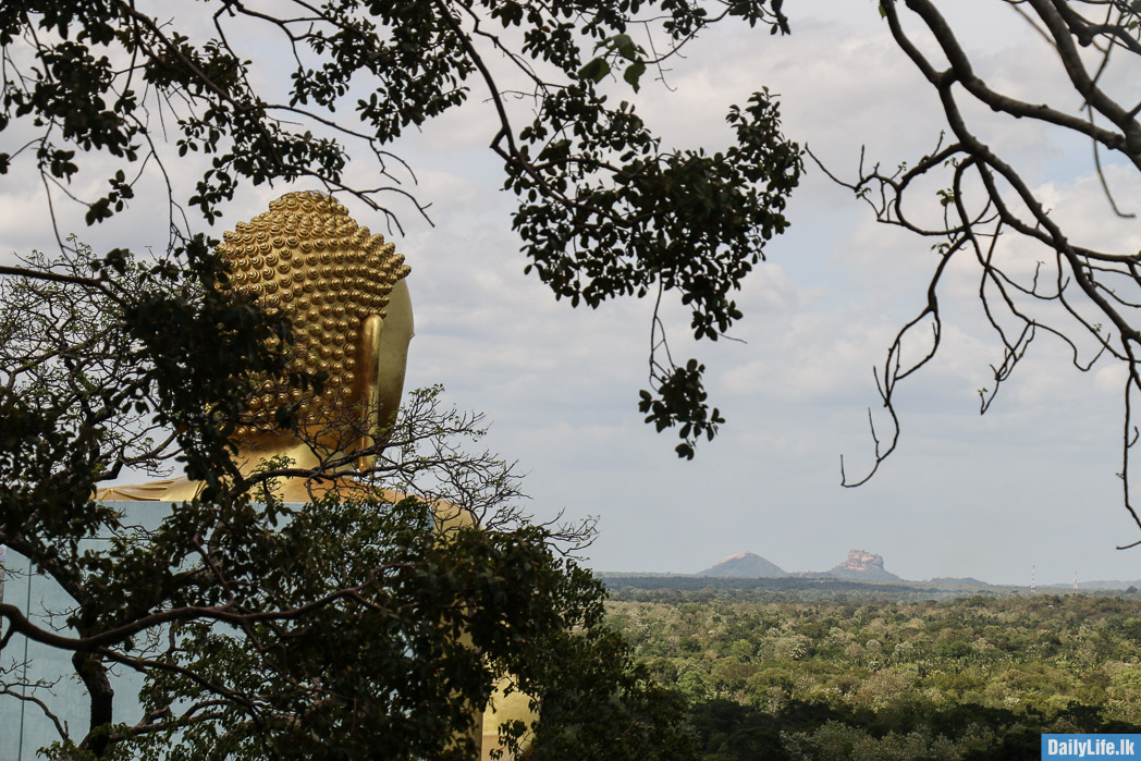 View of Sigiriya with Golden Buddha Statue Dambulla